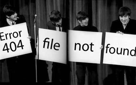 The Beatles holding 'Error 404 file not found' signs