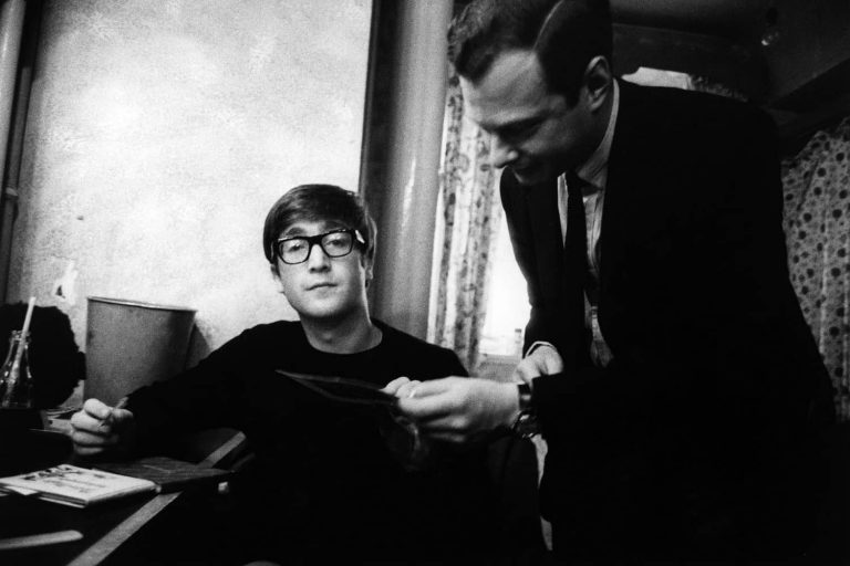 John Lennon and Brian Epstein, 1963
