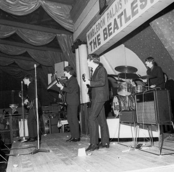 The Beatles onstage at Wimbledon Palais, London, 14 December 1963