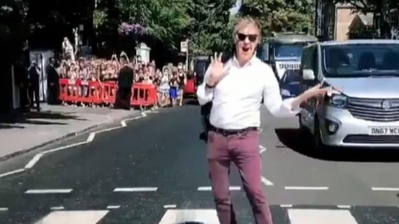 Paul McCartney on the Abbey Road zebra crossing, 23 July 2018