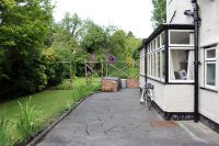 Side garden of Mendips, 251 Menlove Avenue, Liverpool