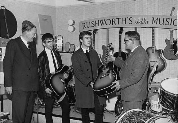 John Lennon and George Harrison receive Gibson J-160E guitars, Rushworth's Music House, Liverpool, September 1962