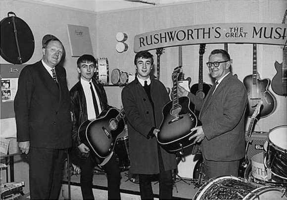 John Lennon and George Harrison receive Gibson J-160E guitars, Rushworth's Music House, Liverpool, September 1962