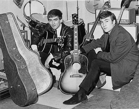 John Lennon and George Harrison receive Gibson J-160E guitars, Rushworth's Music House, Liverpool, September 1962