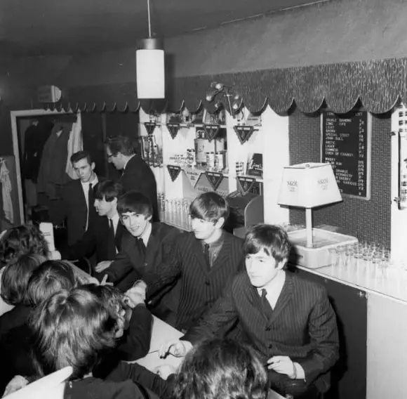 The Beatles signing autographs at Wimbledon Palais, London, 14 December 1963