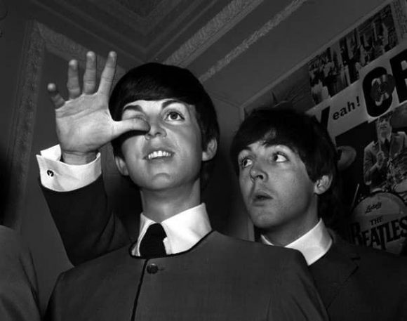 Paul McCartney with his Madame Tussaud's waxwork figure, 29 April 1964