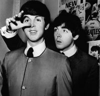 Paul McCartney with his Madame Tussaud's waxwork figure, 29 April 1964
