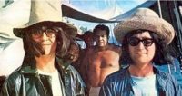 George Harrison and John Lennon disguised in Tahiti, May 1964