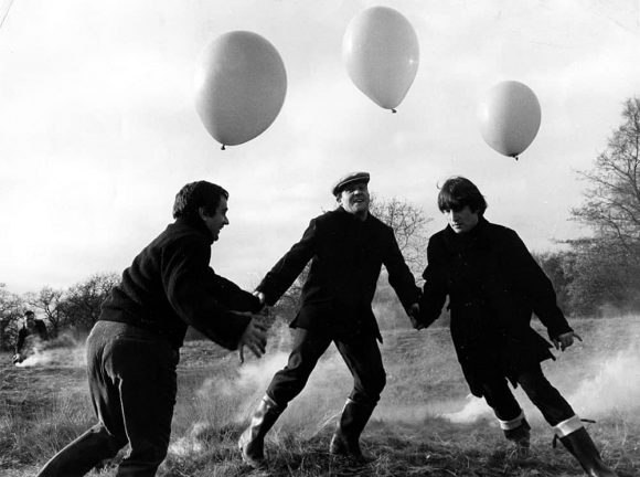 John Lennon, Dudley Moore and Norman Rossington filming Not Only... But Also, Wimbledon Common, London, 20 November 1964