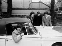 The Beatles on the day John Lennon passed his driving test, 15 February 1965