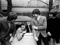 The Beatles on the day John Lennon passed his driving test, 15 February 1965