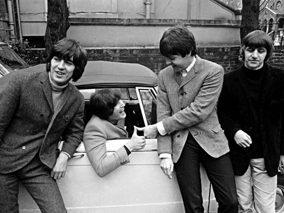 The Beatles on the day John Lennon passed his driving test, 15 February 1965