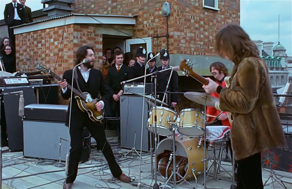 Paul McCartney, Ringo Starr, John Lennon – Apple rooftop, 30 January 1969