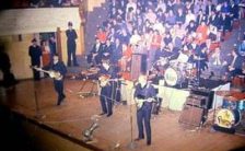 The Beatles on stage in Dunedin, New Zealand, 26 June 1964