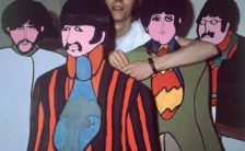 David Bowie with cutouts of The Beatles from Yellow Submarine