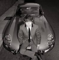 George Harrison with his Jaguar E-Type, July 1964