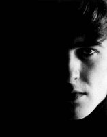 George Harrison in Stuart Sutcliffe's art studio at Astrid Kirchherr's house, 1962