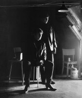 John Lennon and George Harrison in Stuart Sutcliffe's art studio at Astrid Kirchherr's house, 1962