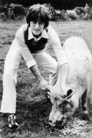 Imagine postcard - John Lennon with a pig