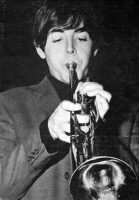 Paul McCartney playing the trumpet