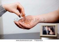 stock-photo-woman-takes-off-an-engagement-ring-family-conflict-close-up-a-frustrated-woman-gives-an-778264924.jpg