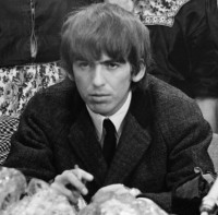 The_Beatles_arrive_at_Schiphol_Airport_1964-06-05_-_George_Harrison_916-5132_cropped.jpg