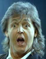 Paul-McCartney-mugs-for-faithful-fans-during-his-rain-soaked-concert-at-Milwaukee-County-Stadium-in-1993.-Credut.-Rick-Wood-Milwaukee-Journal-Sentinel-3.jpg