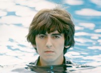 George-Harrison-in-water-up-to-his-neck.jpg